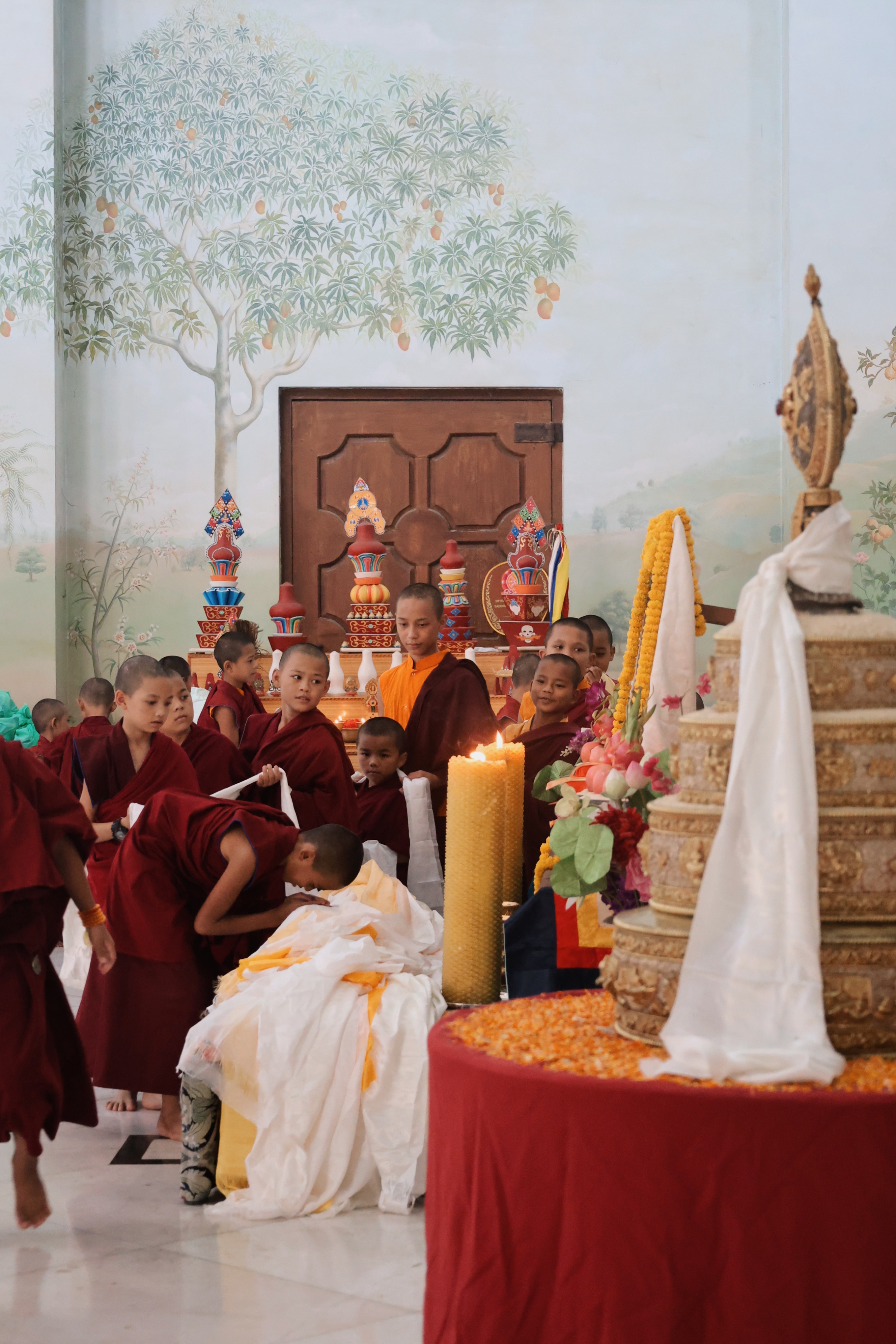 Tsog Puja ceremony with monks and guests praying for Rinpoche’s long life