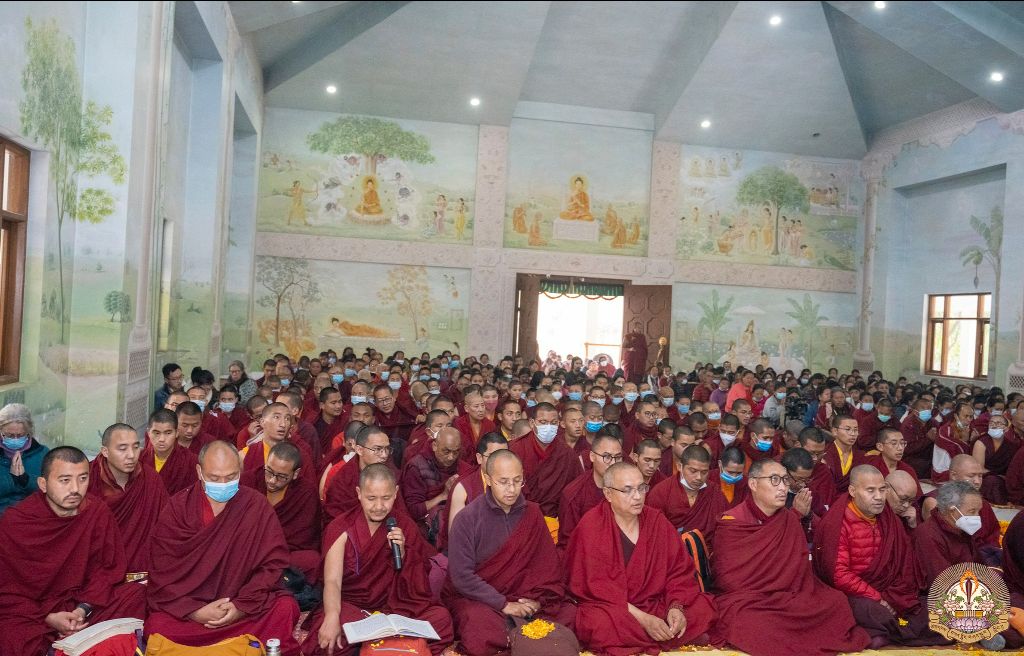 Students offer prayers alongside Chokyi Nyima Rinpoche